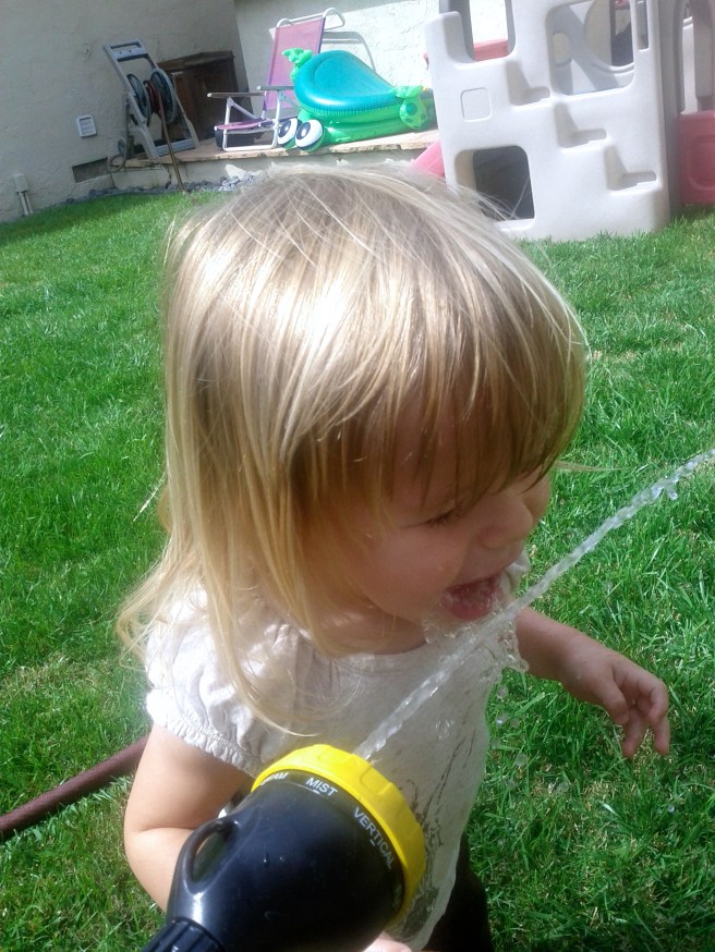 water the plants and then the girl