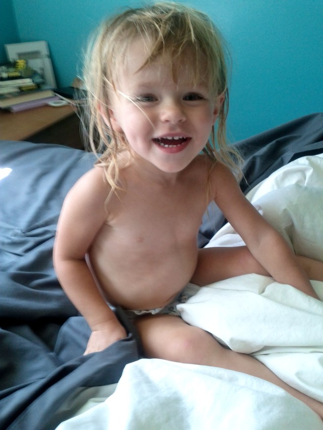 All smiles. Thank the maker of wine she didn't puke on our bed.