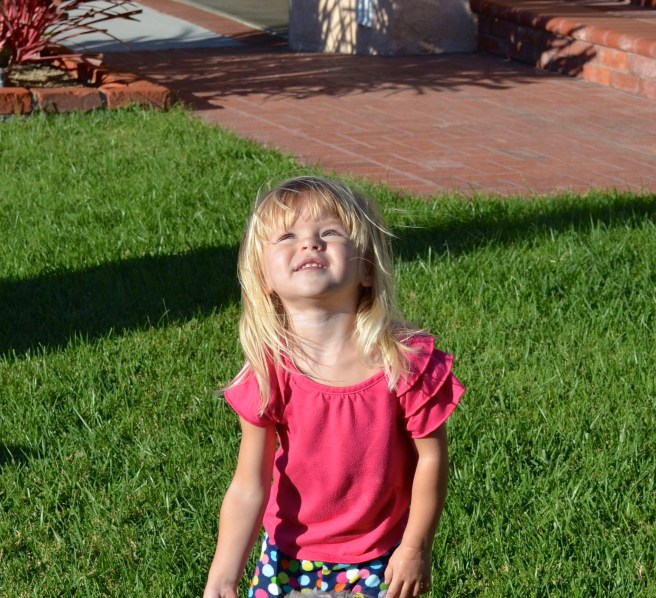 Kaili ready to throw the Frisbee for Banner 9-28-13